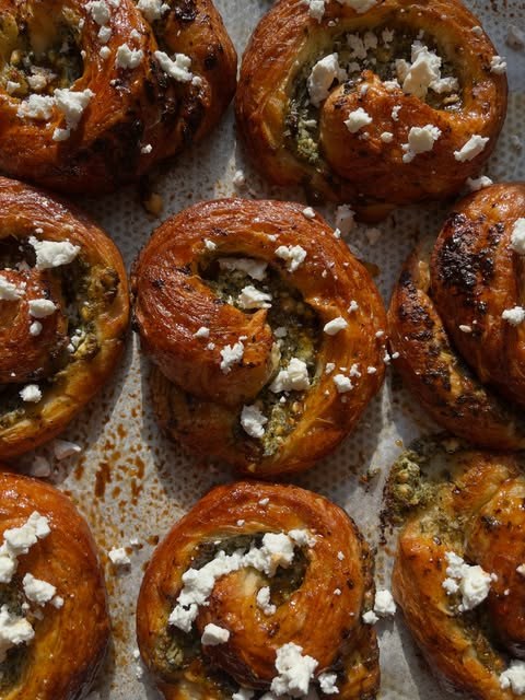 Savoury pesto and feta pastry swirls fresh from the oven